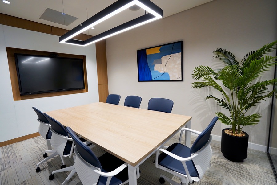 Professional corporate meeting room interior design and furnishing by Almoayyed Contracting Group.