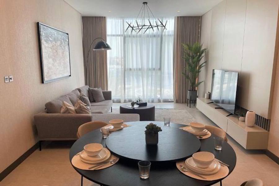 High-end residential dining and living room fit-out by Almoayyed Contracting Group.