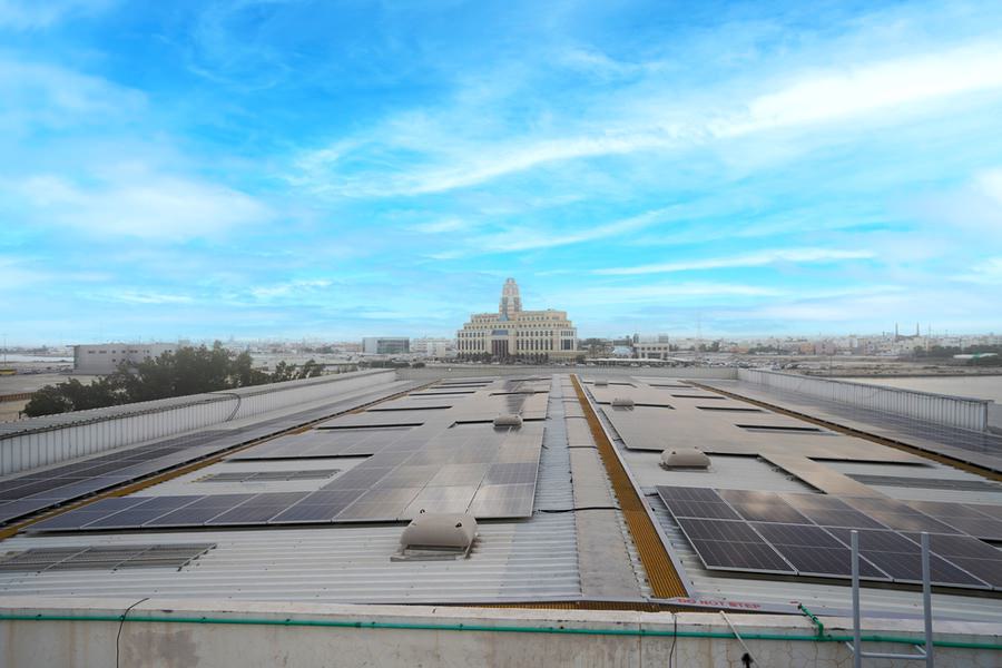 Rooftop view of an Almoayyed Contracting Group solar energy system installation in Bahrain.