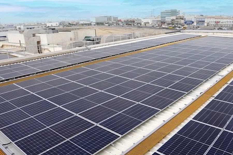 Rooftop solar panel array installation providing sustainable energy solutions by Almoayyed Contracting Group.