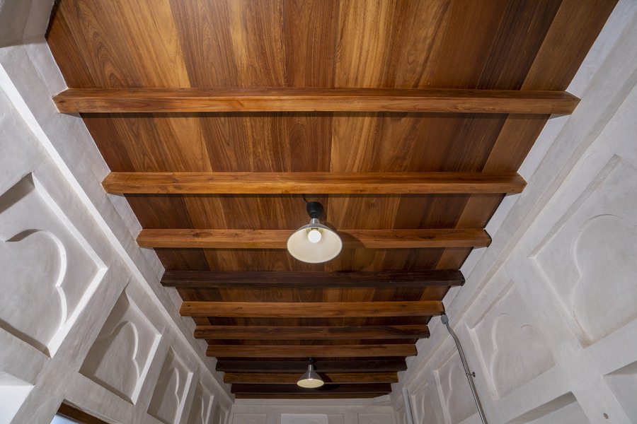 Traditional timber ceiling craftsmanship and restoration by Almoayyed Contracting Group.