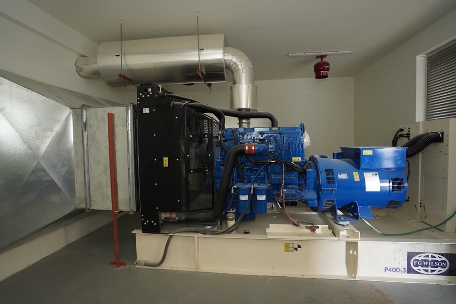 Large scale industrial power generator and MEP equipment installed by Almoayyed Contracting Group.