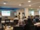 Almoayyed Contracting Group employees attending a corporate training seminar in a conference room.