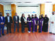 Almoayyed Contracting Group leadership team standing together in a formal setting